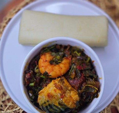 Eba with efo riro, fish and shrimp